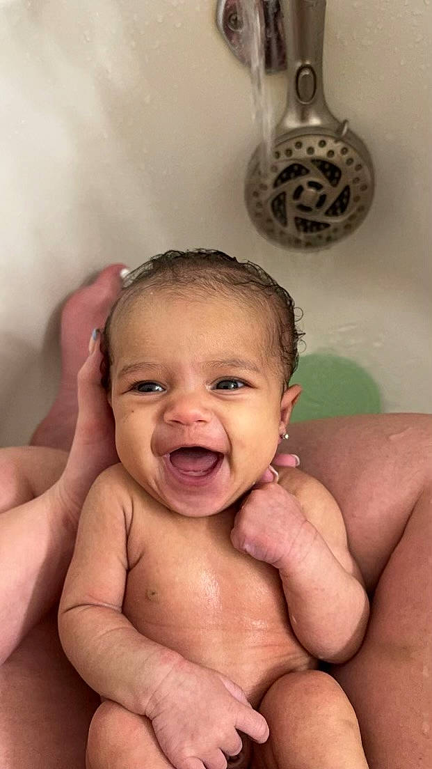 Emersyn joined the competition — help win amazing prizes! arm, baby_bathing, cheek, eye, eyebrow, face, forehead, hair, hand, head, human_body, joint, leg, lip, mouth, muscle, nose, person, skin, smile