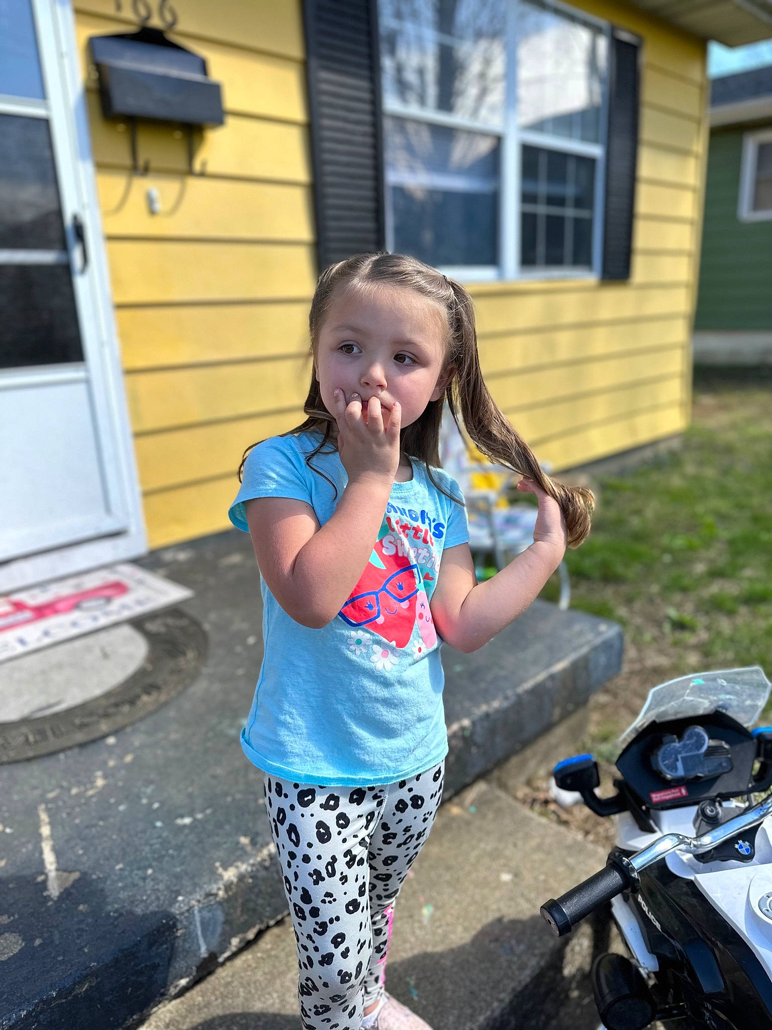 Lindsey joined the competition — help win amazing prizes! asphalt, automotive_lighting, child, electric_blue, eyewear, fun, grass, happy, house, leisure, motor_vehicle, motorcycle, person, personal_protective_equipment, recreation, road, sidewalk, street, t_shirt, toddler