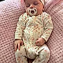 Jasmine joined the competition — help win amazing prizes! baby, infant, sleeping, pacifier, headband, pink_blanket, floral_onesie, hand, legs, cute, cozy, soft_texture, portrait, newborn, nap, bedding, fabric, peaceful, pillow, closeup