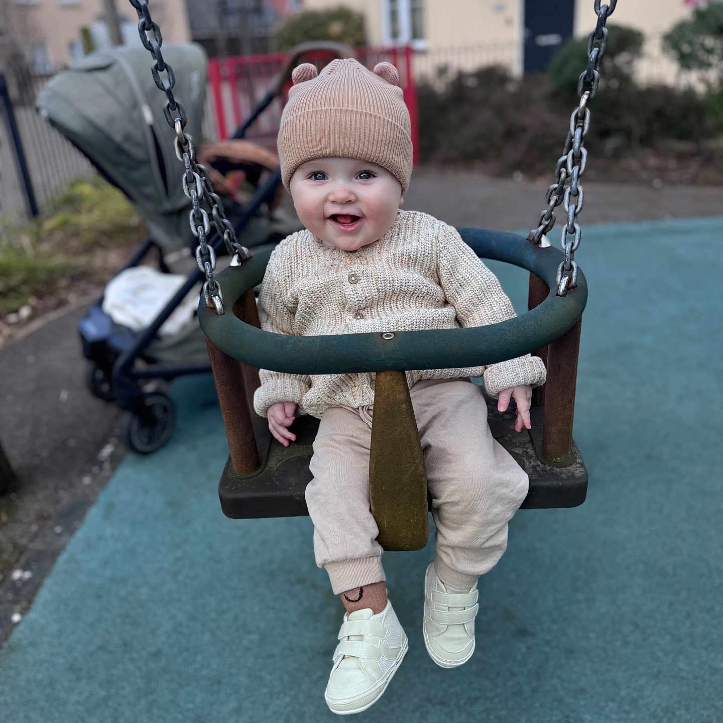 Hugo joined the competition — help win amazing prizes! baby, cap, clothing, face, footwear, happy, hat, head, outdoorplayarea, outdoors, pants, person, photography, playarea, portrait, shoe, sitting, smile, swing, toy