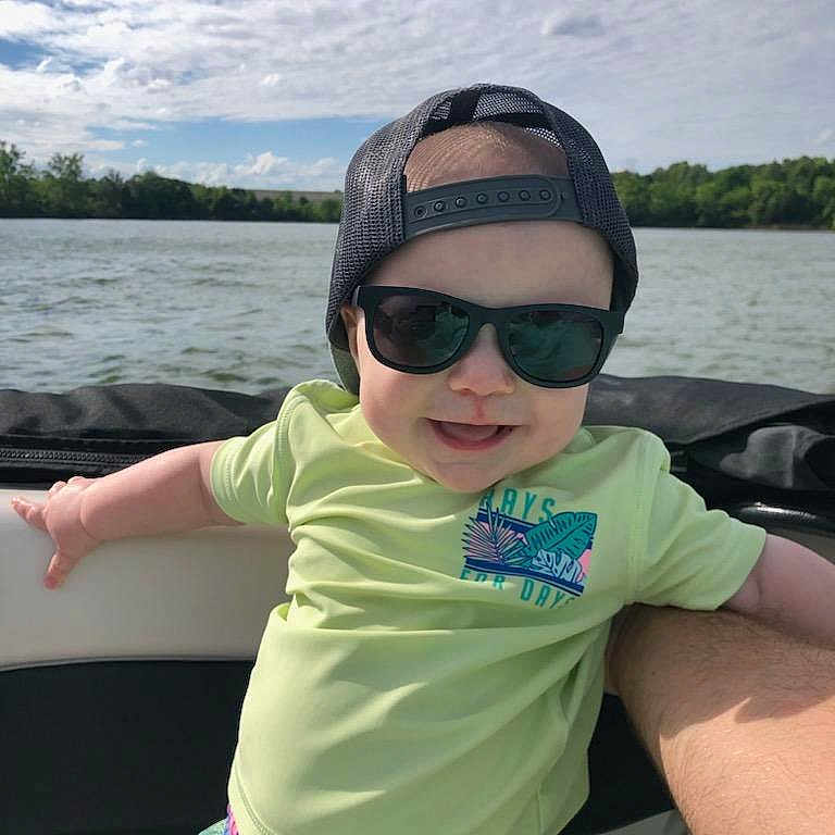 Aiden joined the competition — help win amazing prizes! accessories, baby, baseballcap, cap, clothing, face, glasses, hat, head, lake, nature, outdoors, person, photography, portrait, shorts, summer, sunglasses, t_shirt, water