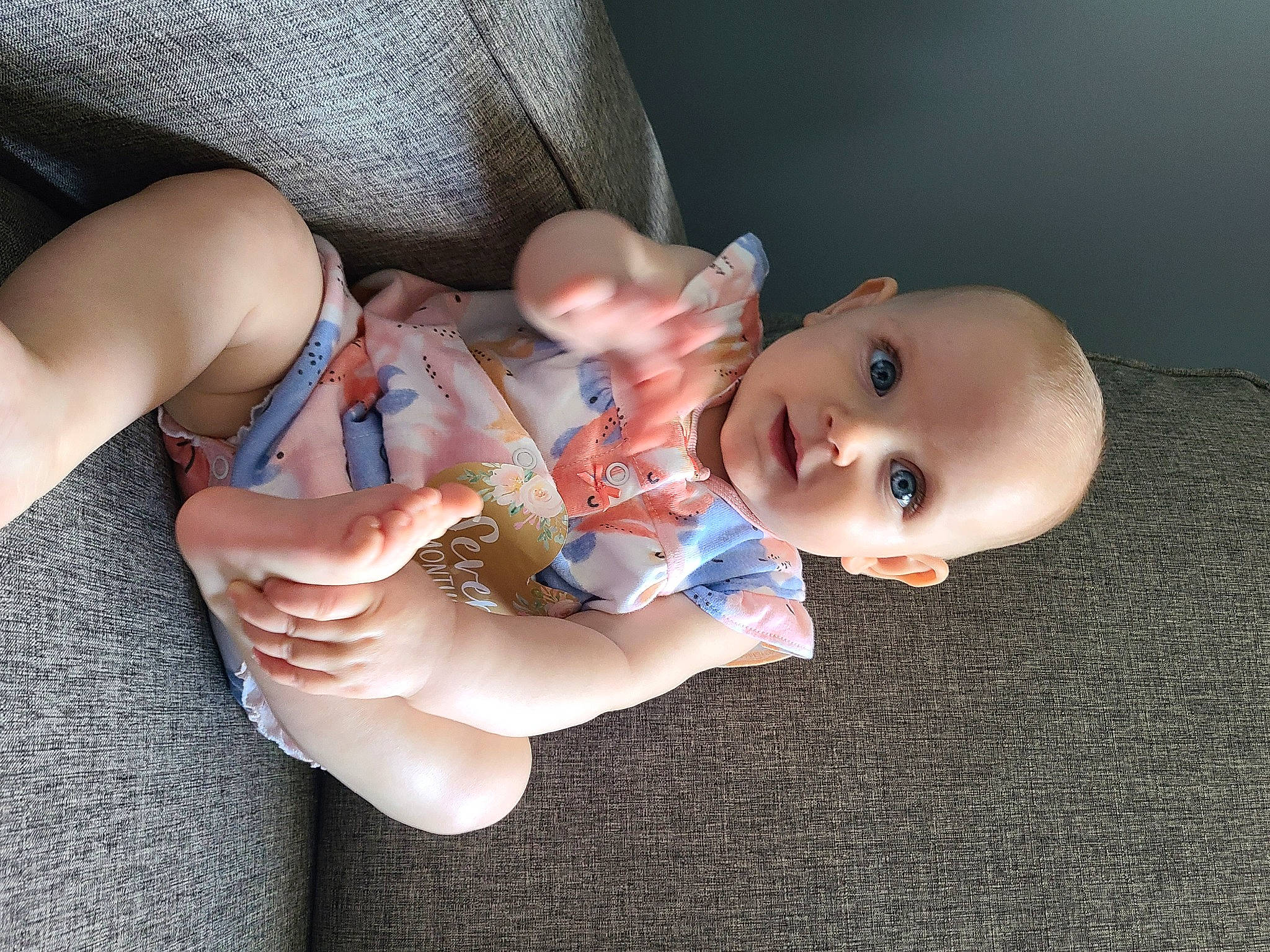 Rowan is registered to the contest to win money with this photo: baby, baby_products, baby_toddler_clothing, cheek, child, doll, eye, eyelash, finger, gesture, hand, iris, joint, lip, nail, nose, person, skin, thumb, toddler