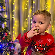 Ianis joined the competition — help win amazing prizes! baby, biting, eating, face, festival, food, head, lighting, person, photography, portrait, sweets