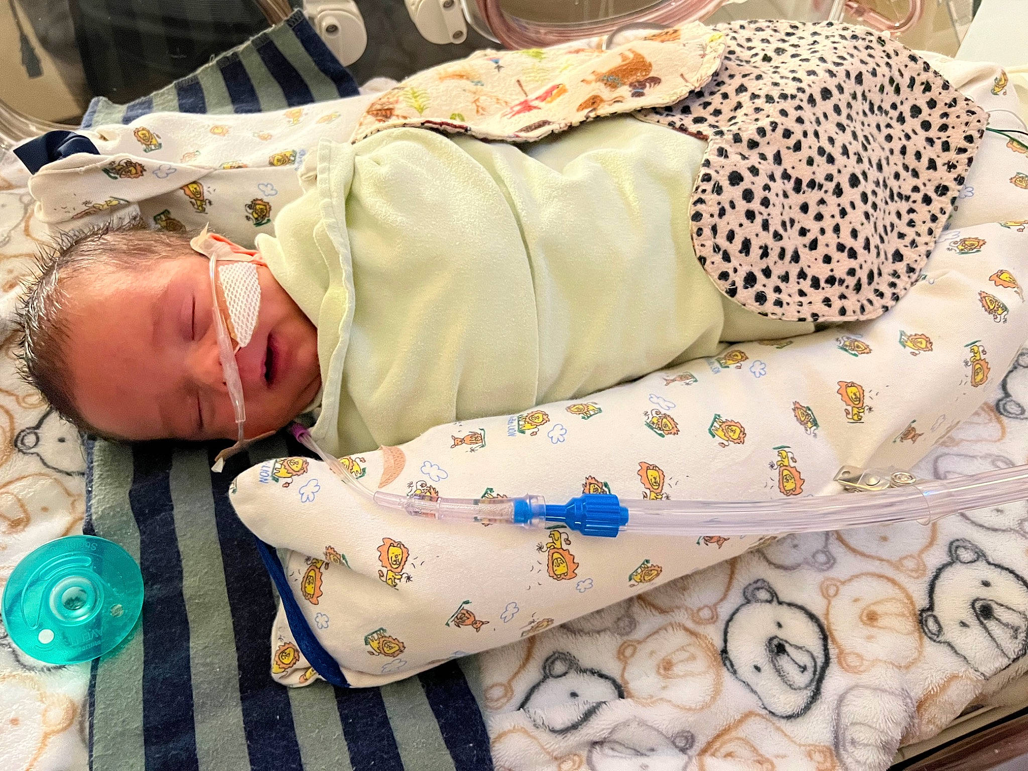 Fernando is registered to the contest to win money with this photo: bedding, child, comfort, couch, event, happy, linens, nap, pattern, person, room, sleep, studio_couch, textile