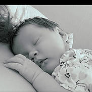 Elora joined the competition — help win amazing prizes! baby, sleeping, infant, closeup, monochrome, peaceful, hand, face, soft, curls, portrait, newborn, child, resting, cute, calm, skin, clothing, indoor, tender
