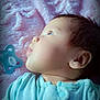 Elora is registered to the contest to win money with this photo: baby, blanket, blue_clothing, child, cute, ear, expression, face, head, indoors, infant, lying_down, newborn, pacifier, portrait, resting, side_profile, skin, sleepwear, soft_texture