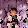 baby, infant, child, car_seat, safety_harness, pink, purple, striped_clothing, socks, seated, portrait, indoor, vehicle, secure, harness, floral_pattern, red_buckle, cozy, baby_carrier, photography
