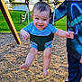 Jaythan joined the competition — help win amazing prizes! baby, child, clothing, daylight, face, fence, footwear, grass, hand, happy, hoodie, legs, outdoor, person, playground, sandals, smiling, sunlight, swing, tree
