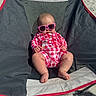 baby, child, sunglasses, romper, red_and_white, cherry_pattern, camping_chair, beach, sand, outdoor, sunny, cute, relaxed, infant, legs, feet, summer, shade, fashion, portrait