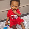 Sohan joined the competition — help win amazing prizes! toddler, child, smiling, red_clothing, toy, playpen, blanket, indoor, happy, person, cute, sitting, baby, feet, hair, face, hand, playtime, nautica, casual