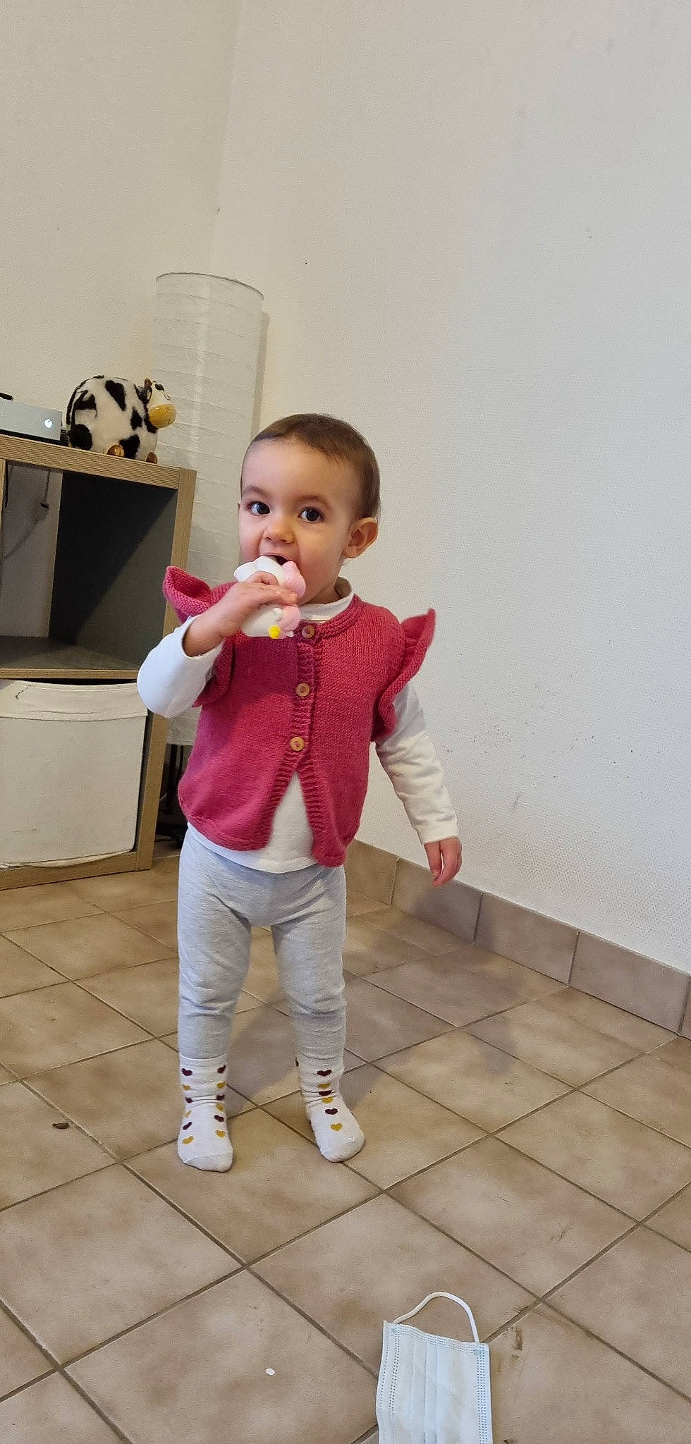 Camélia participe au concours pour gagner de l'argent avec cette photo : arm, baby, baby_toddler_clothing, eye, face, finger, floor, flooring, gesture, hair, happy, head, human_body, joint, kitchen_appliance, neck, person, skin, sleeve, toddler