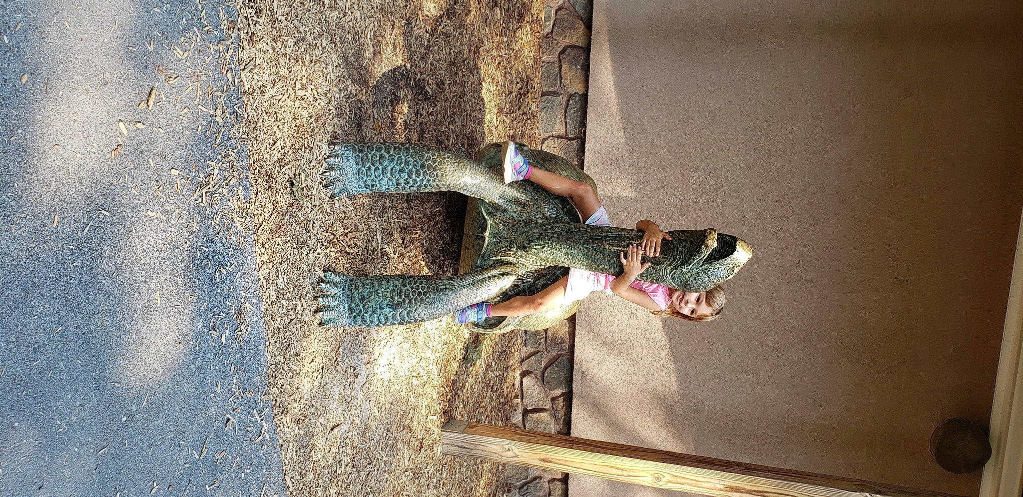 Denise is registered to the contest to win money with this photo: boot, concrete, denim, dress, foot, fun, human_leg, landscape, leg, person, shadow, soil, tree, visual_arts, waist, walking_shoe, wood