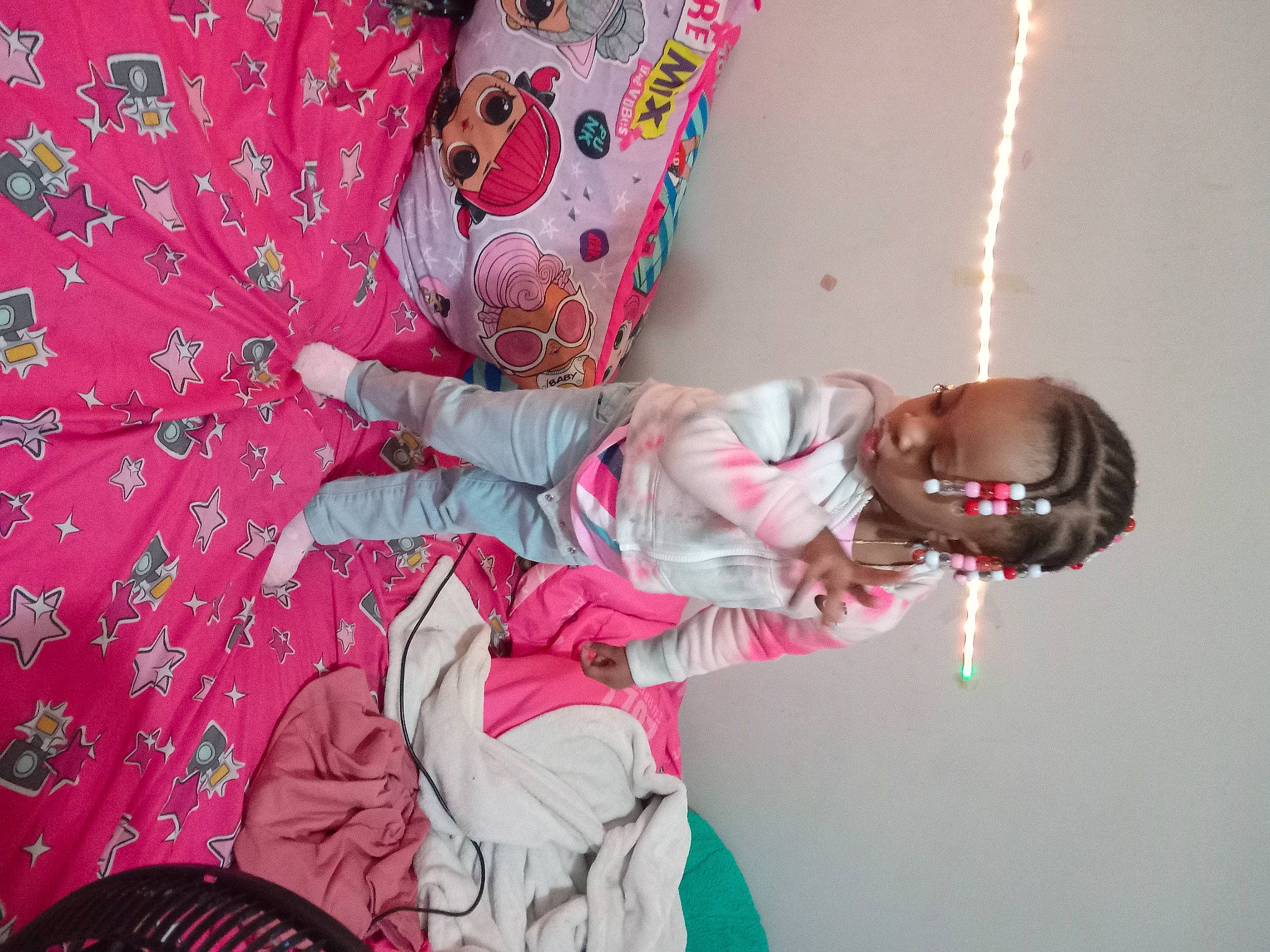 A'Mora is registered to the contest to win money with this photo: baby, baby_toddler_clothing, bedding, child, comfort, event, fun, happy, leisure, linens, magenta, mechanical_fan, pattern, person, petal, pink, plant, room, toddler, tree