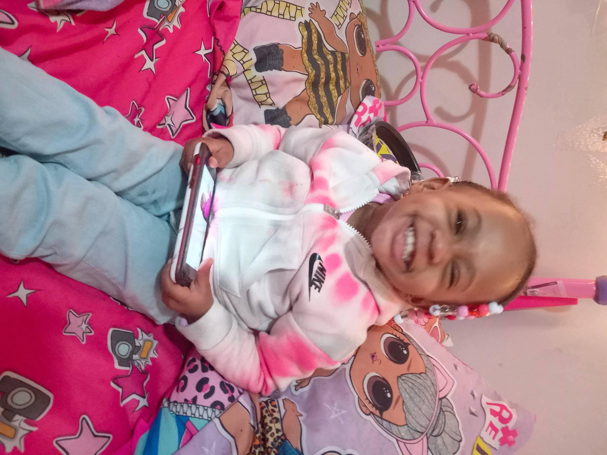 A'Mora is registered to the contest to win money with this photo: baby, baby_toddler_clothing, carmine, cheek, child, comfort, event, eyelash, fun, happy, joy, linens, magenta, pattern, person, pink, room, skin, smile, toddler