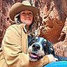 Munchie joined the competition — help win amazing prizes! adventure, blue_jeans, canyon, casual_clothing, closeup, cuddle, dog, friendship, happy, hat, jacket, nature, outdoor, pet, portrait, rock, smile, sunlight, travel, woman