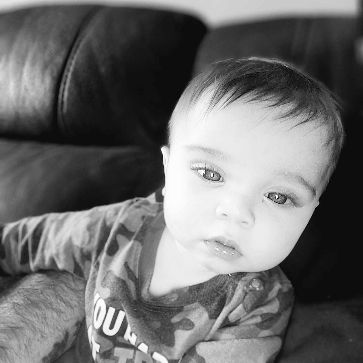 Jameson joined the competition — help win amazing prizes! architecture, baby, bodypart, building, clothing, couch, cushion, face, finger, furniture, hand, head, homedecor, indoors, livingroom, person, photography, portrait, room, t_shirt