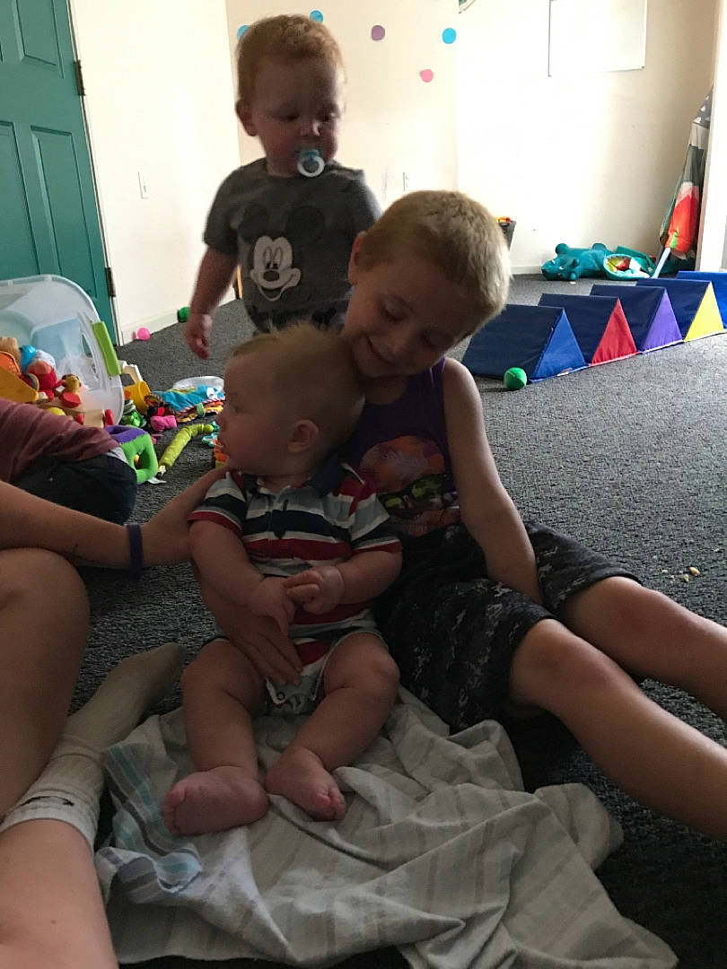 Noah joined the competition — help win amazing prizes! arm, child, finger, fun, lap, leg, person, play, sitting, thigh, toddler, under_exposed, vacation