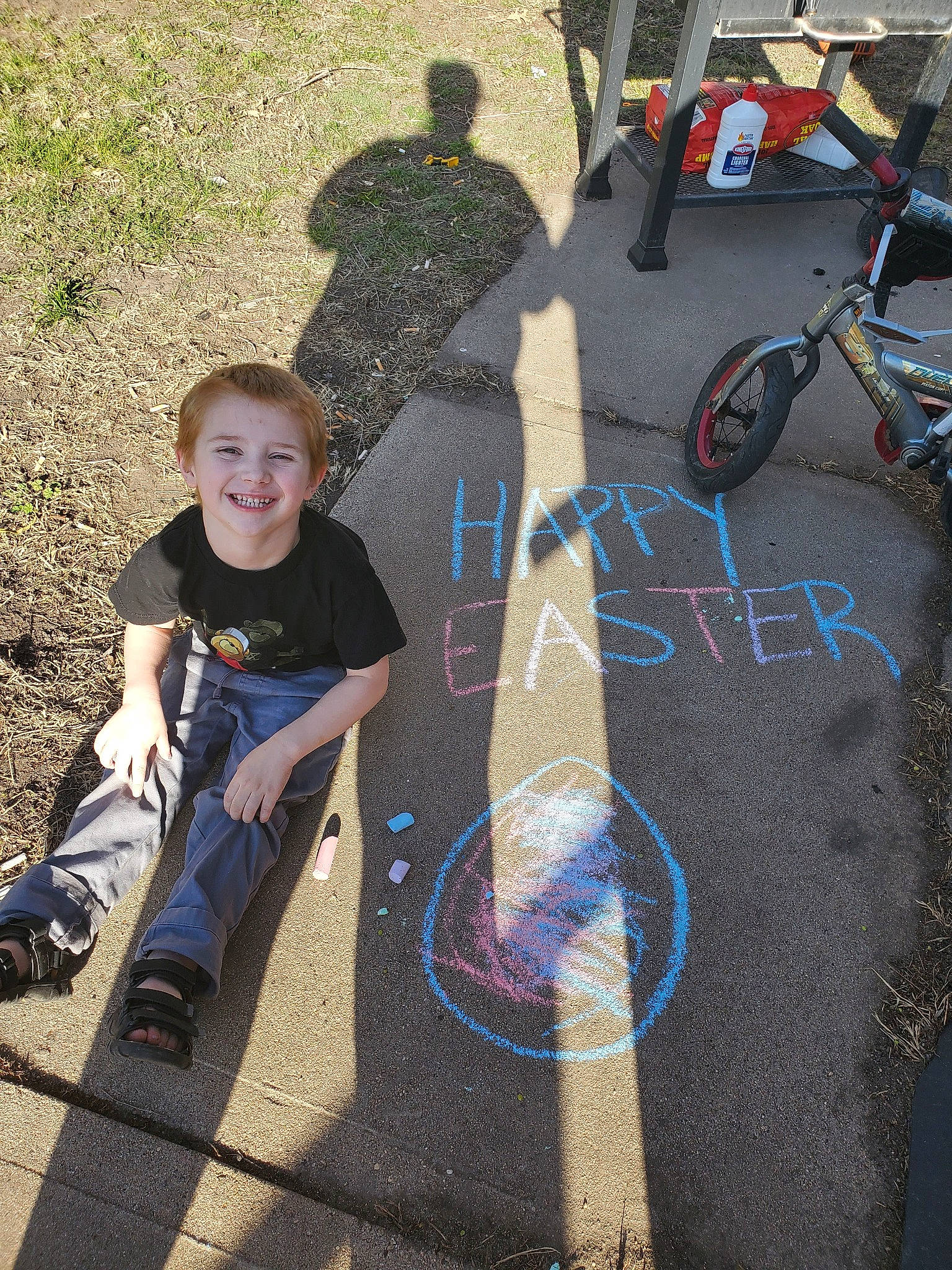 Noah is registered to the contest to win money with this photo: art, asphalt, joy, lane, person, recreation, road_surface, shadow, sidewalk, tree, vehicle