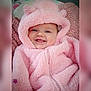 adorable, baby, baby_fashion, blanket, child, cozy, cute, face, fluffy_texture, happy, hooded_onesie, indoors, infant, person, pink_clothing, portrait, smiling, soft, toddler, warm_clothing