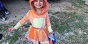 Lainey is registered to the contest to win money with this photo: child, costume, fox, orange, halloween, bucket, toyota, car, camry, gravel, grass, stroller, carport, smile, outdoor, footwear, hood, dress, daylight, cute