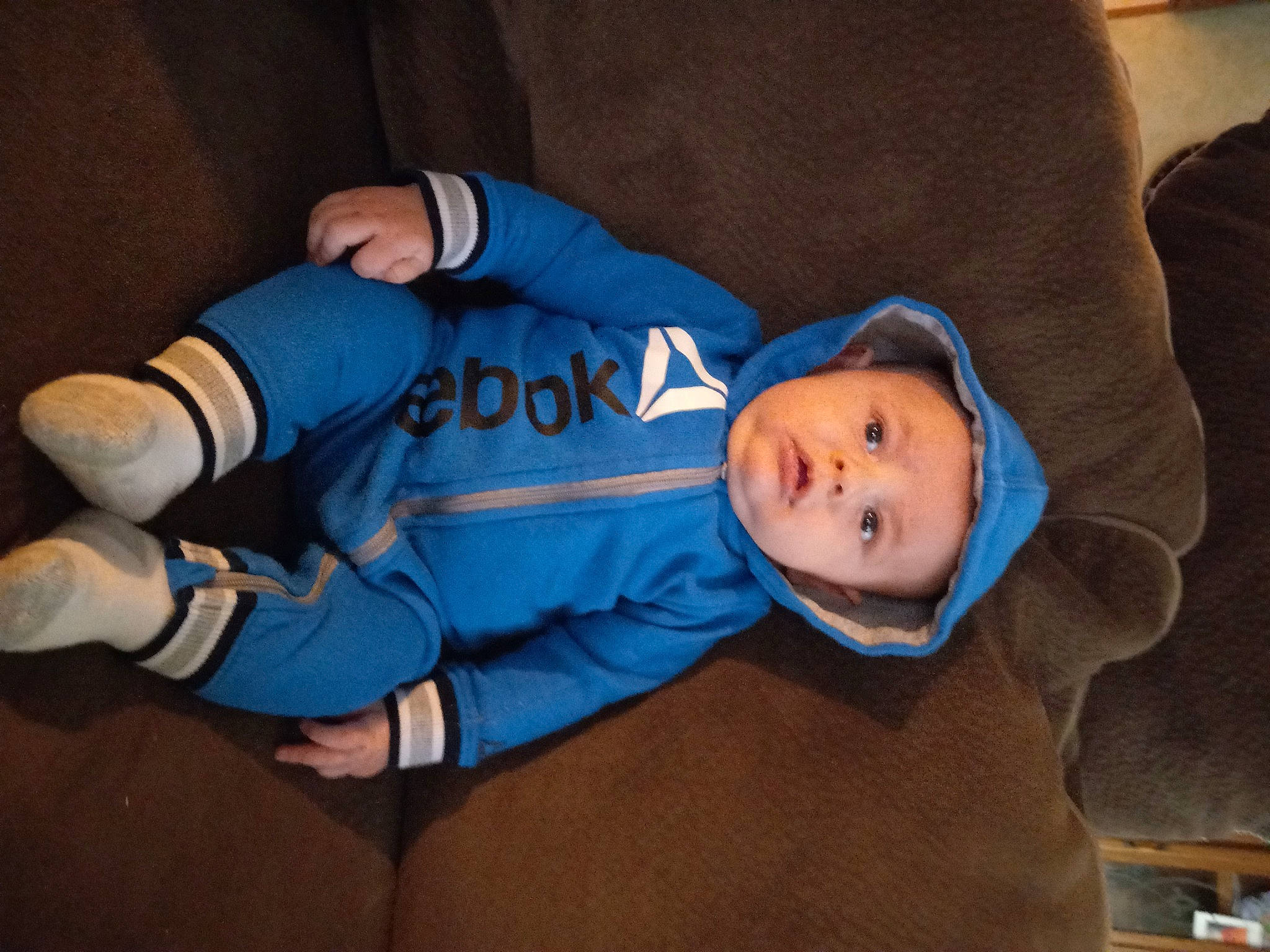 Izaiah joined the competition — help win amazing prizes! baby, baby_toddler_clothing, child, comfort, electric_blue, fun, headwear, long_sleeved_t_shirt, nap, person, room, sitting, sleep, sleeve, toddler