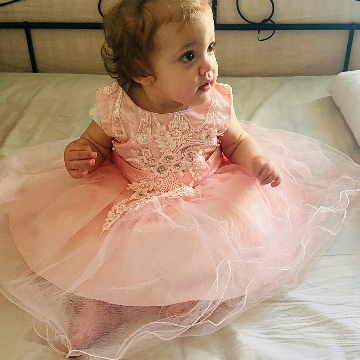 Kéllya participe au concours pour gagner de l'argent avec cette photo : baby, bed, bedroom, clothing, costume, cushion, dress, face, fashion, formalwear, furniture, gown, head, homedecor, indoors, person, photography, portrait, room, sitting