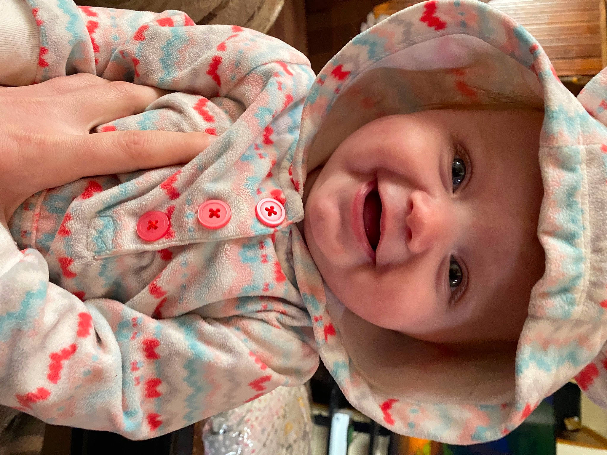Cecilia is registered to the contest to win money with this photo: baby, cheek, chin, eye, eyebrow, face, facial_expression, happy, headwear, human, iris, lip, mammal, mouth, nose, person, pink, product, skin, smile