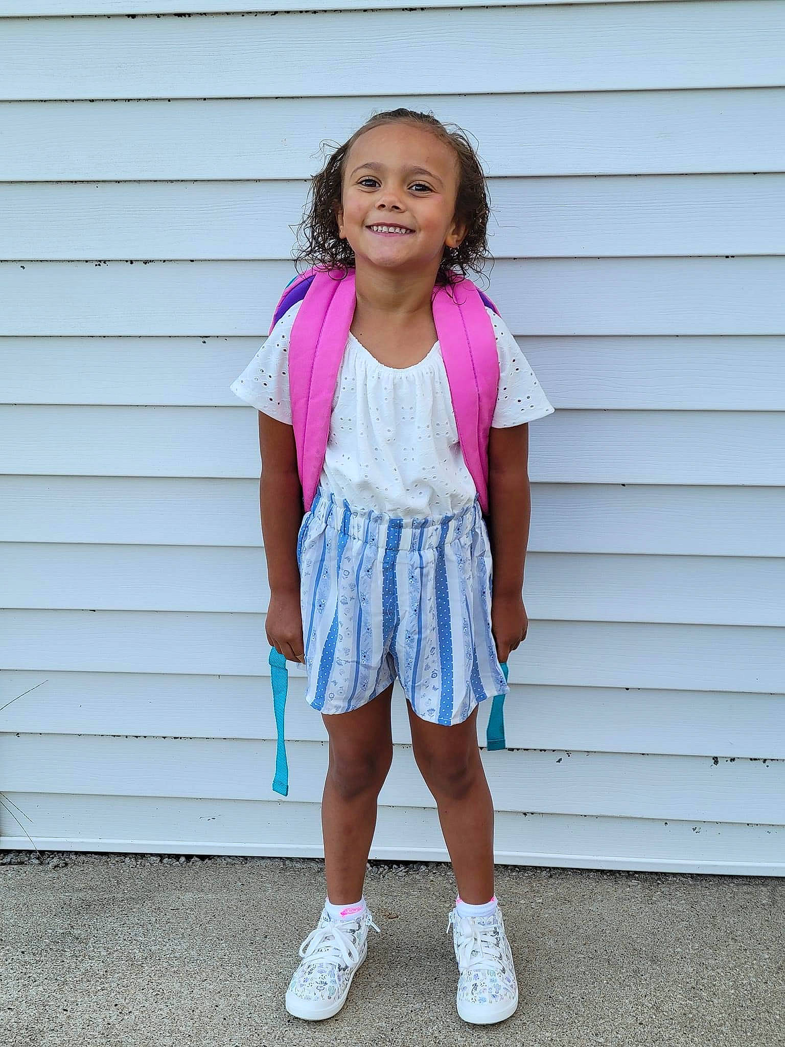Kaylynn is registered to the contest to win money with this photo: arm, baby_toddler_clothing, electric_blue, fashion_accessory, hair, happy, human_body, human_leg, jewellery, joy, knee, magenta, neck, person, pink, purple, sleeve, smile, standing, t_shirt