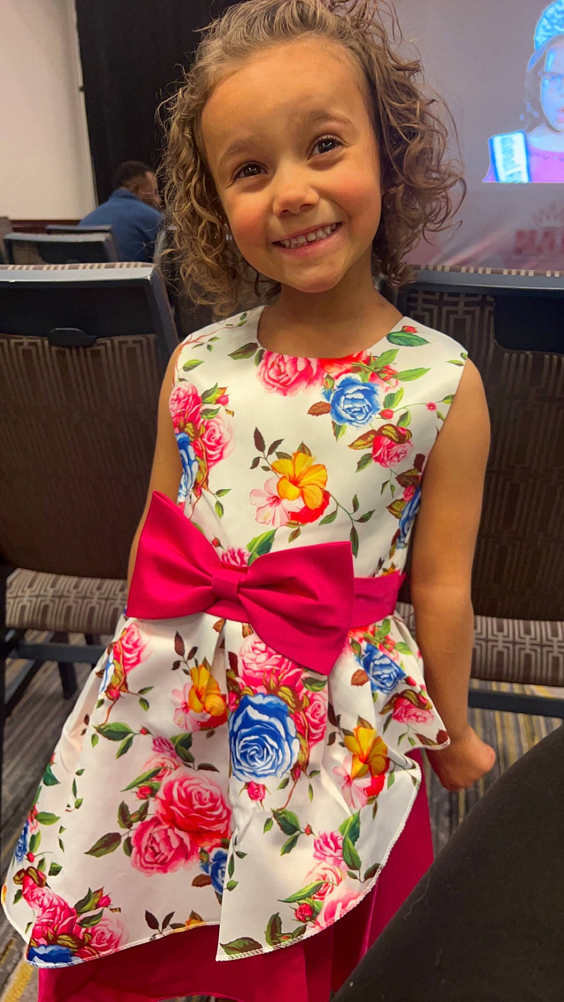Kaylynn joined the competition — help win amazing prizes! beauty, child, day_dress, dress, embellishment, event, fashion, fashion_design, formal_wear, hair, happy, head, joy, one_piece_garment, pattern, peach, person, skin, sleeve, smile