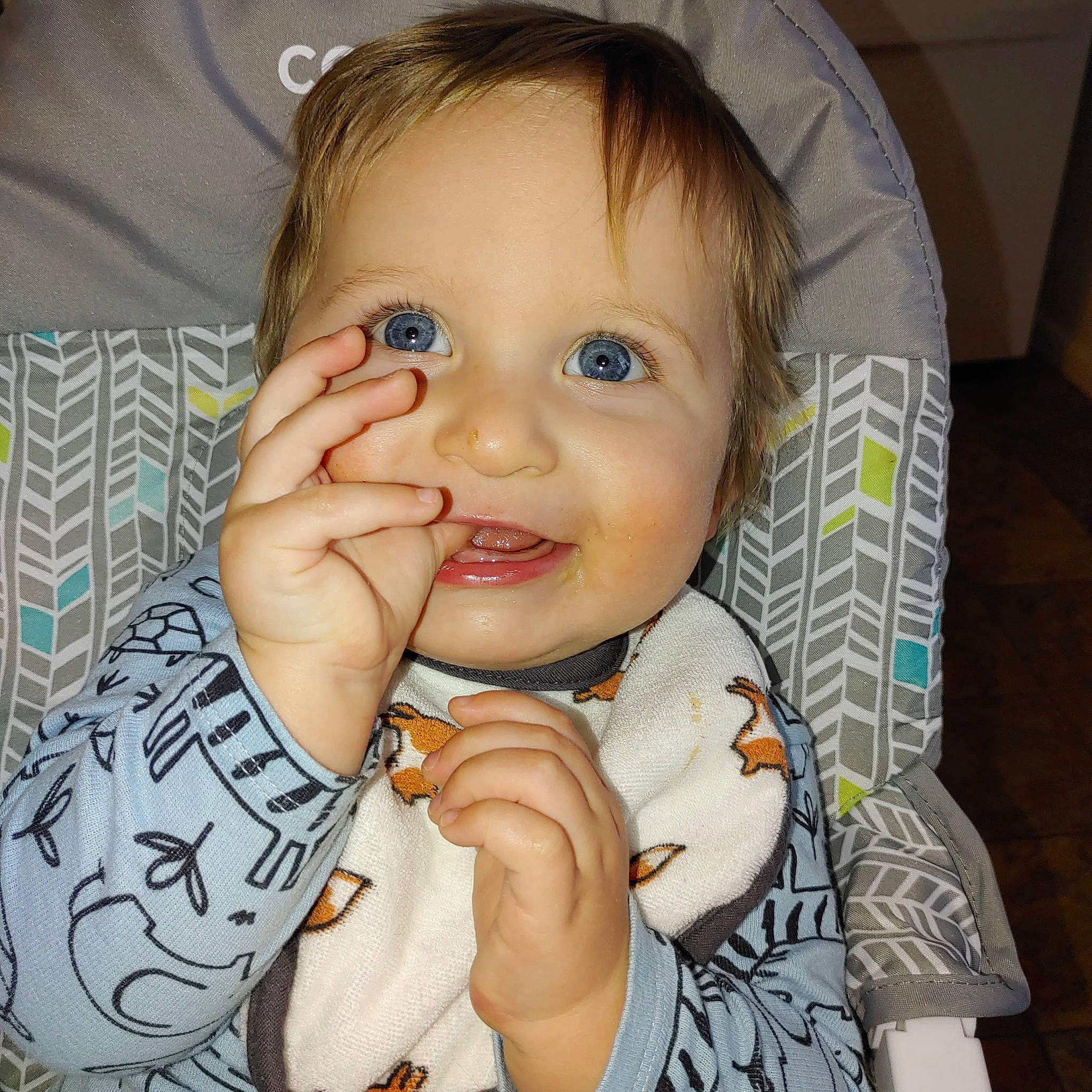 Easton is registered to the contest to win money with this photo: arm, cheek, chin, ear, eye, eyebrow, eyelash, finger, gesture, hand, head, iris, jaw, lip, mouth, neck, nose, person, skin, sleeve