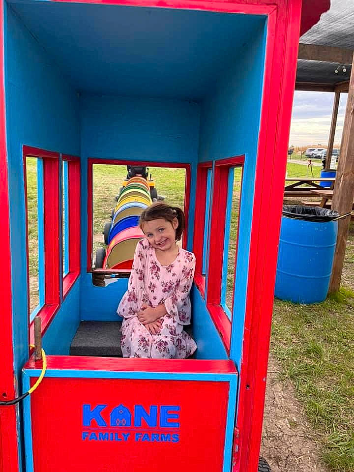 Emersyn joined the competition — help win amazing prizes! baby_toddler_clothing, child, chute, city, electric_blue, fun, grass, human_settlement, joy, leisure, magenta, outdoor_play_equipment, person, play, playground, playhouse, recreation, red, room, smile