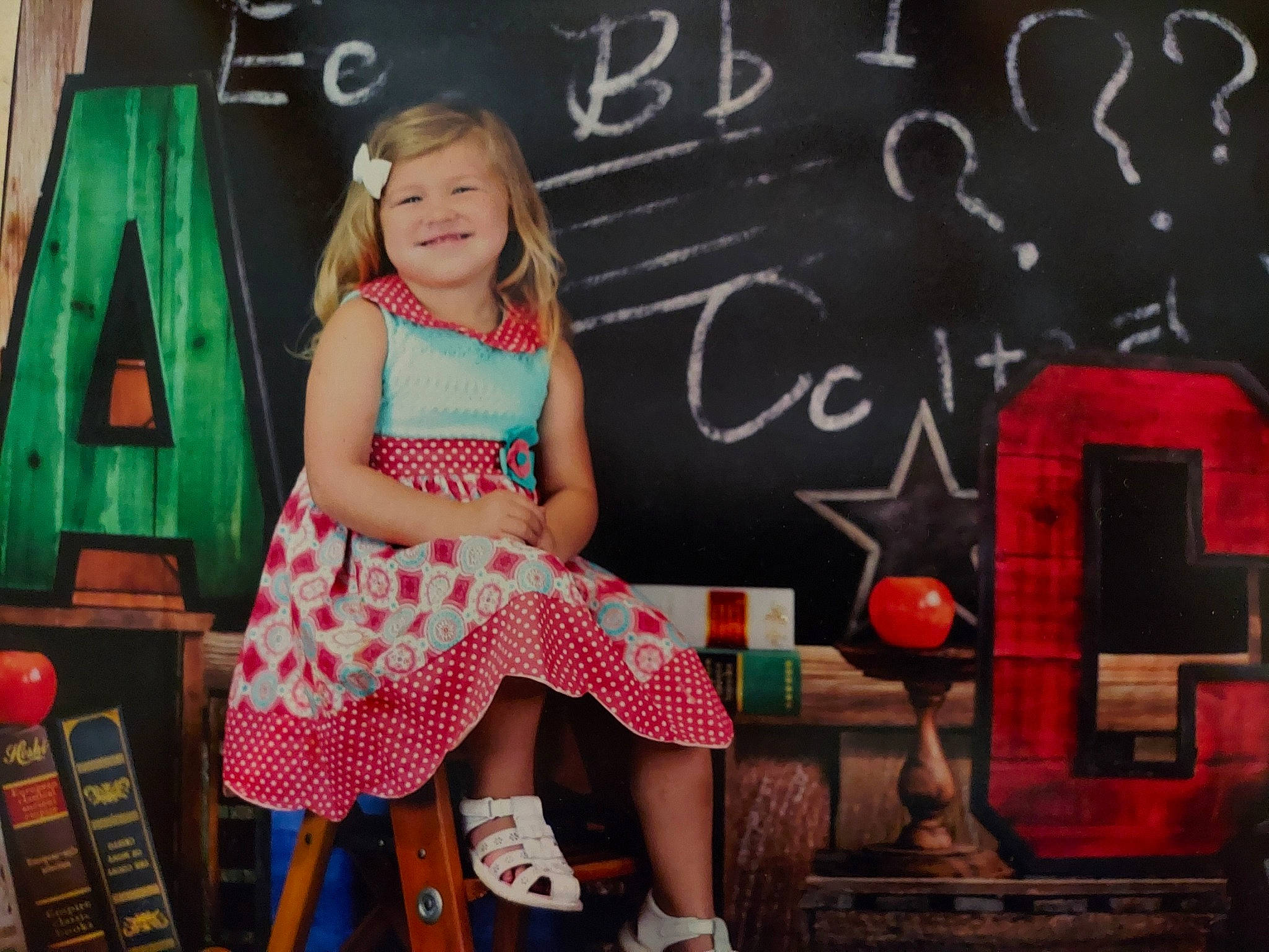 Kinsley joined the competition — help win amazing prizes! blackboard, blond, chalk, child, dress, fashion_design, flash_photography, hair, handwriting, happy, joy, leisure, magenta, pattern, person, pink, plant, shoe, smile, t_shirt