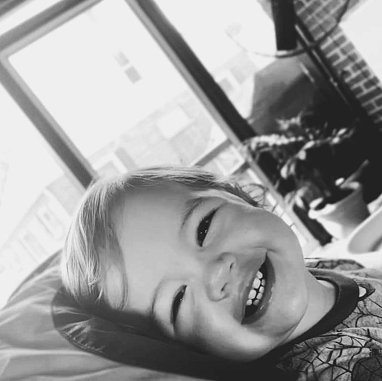 Leonidas is registered to the contest to win money with this photo: black, black_and_white, cheek, chin, comfort, cool, eyebrow, eyelash, flash_photography, happy, human_body, iris, jaw, lip, mouth, nose, person, photograph, smile, style