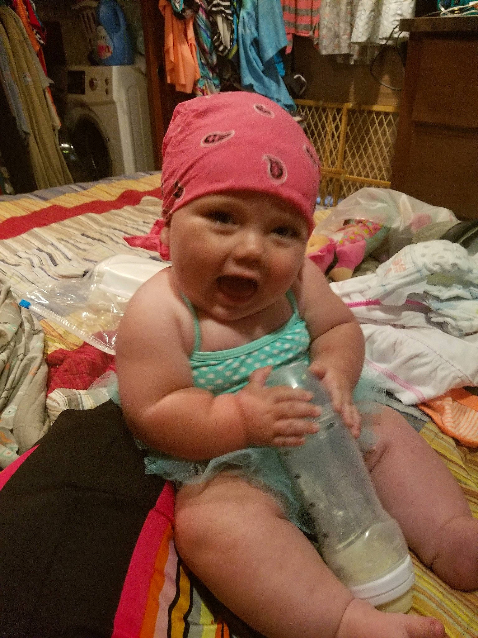 Deanna is registered to the contest to win money with this photo: baby, child, headgear, headwear, person, smile, toddler