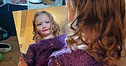 Nevaeh is registered to the contest to win money with this photo: accessories, bag, child, clothing, costume, desk, dress, face, female, formalwear, furniture, girl, handbag, head, jewelry, necklace, person, photography, portrait, purple