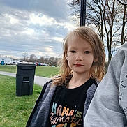 Nevaeh joined the competition — help win amazing prizes! car, child, clothing, face, female, girl, grass, head, knitwear, nature, outdoors, park, person, photography, plant, portrait, sweater, t_shirt, transportation, vehicle