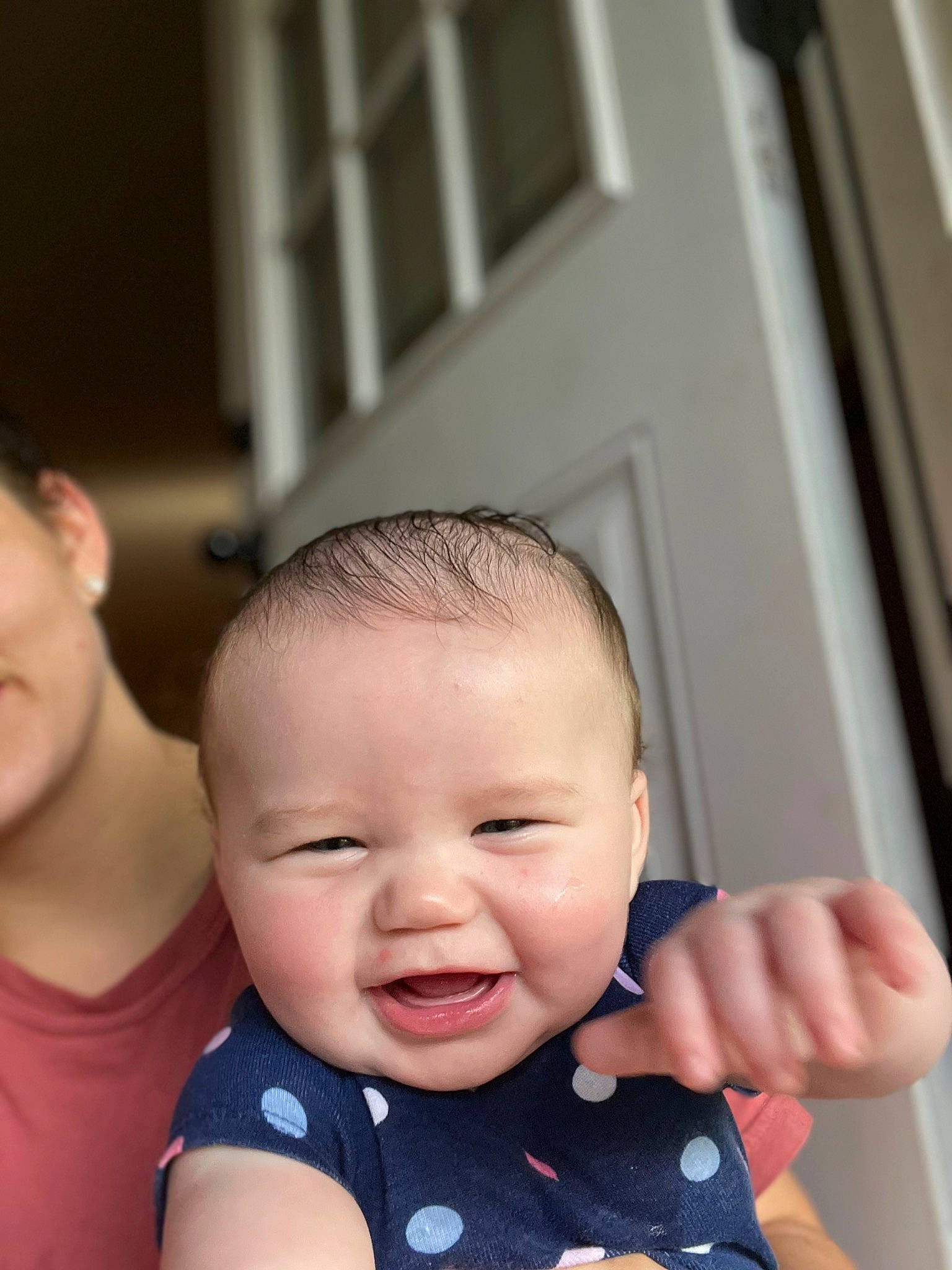 Annalise is registered to the contest to win money with this photo: baby, baby_toddler_clothing, cheek, child, eyebrow, eyelash, finger, flash_photography, gesture, happy, iris, lip, mouth, nose, person, skin, sleeve, smile, t_shirt, thumb