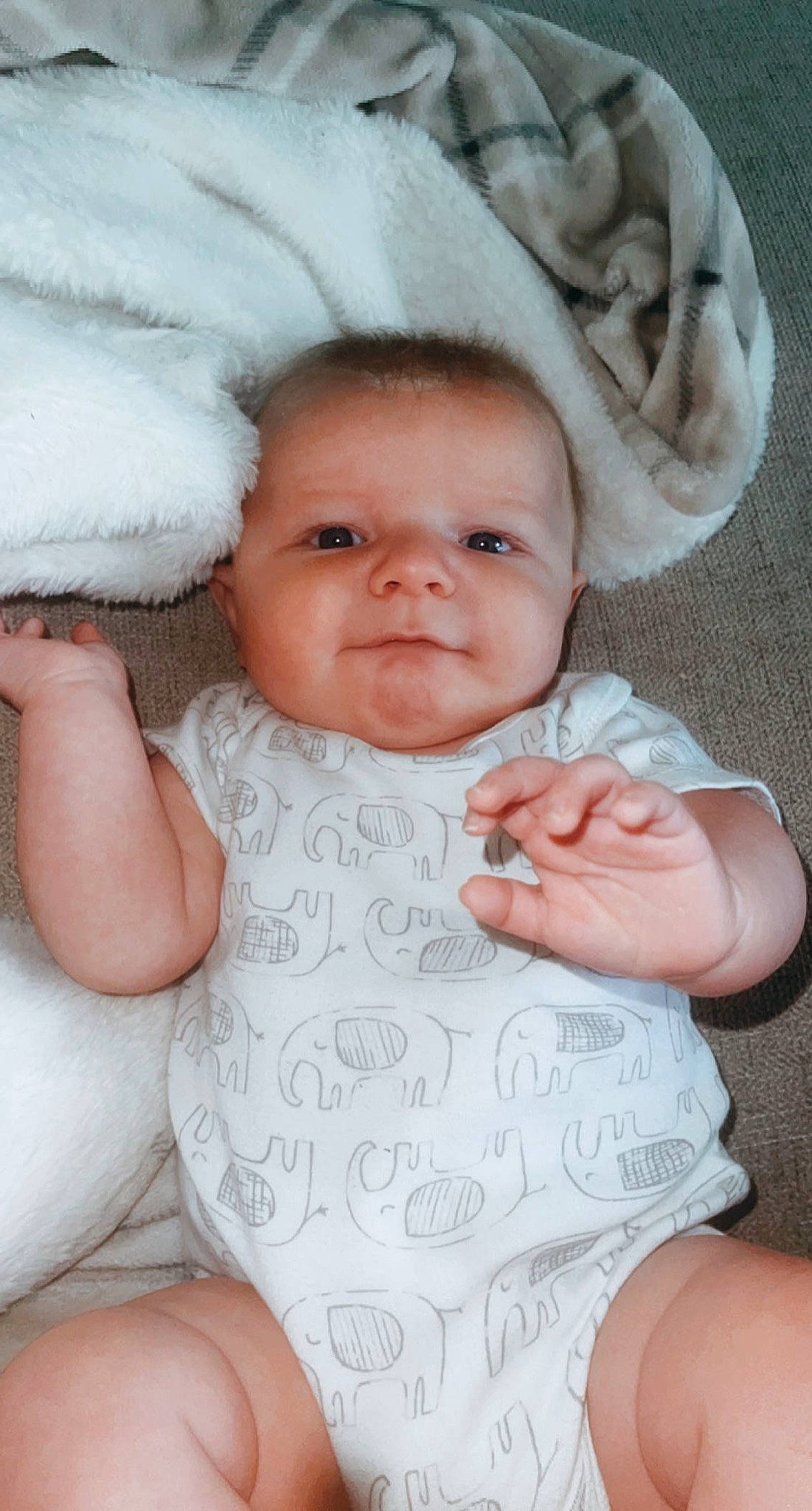 Beckham is registered to the contest to win money with this photo: arm, cheek, chin, comfort, eye, eyebrow, face, facial_expression, hairstyle, hand, human, lip, mouth, muscle, nose, organ, person, skin, smile, stomach