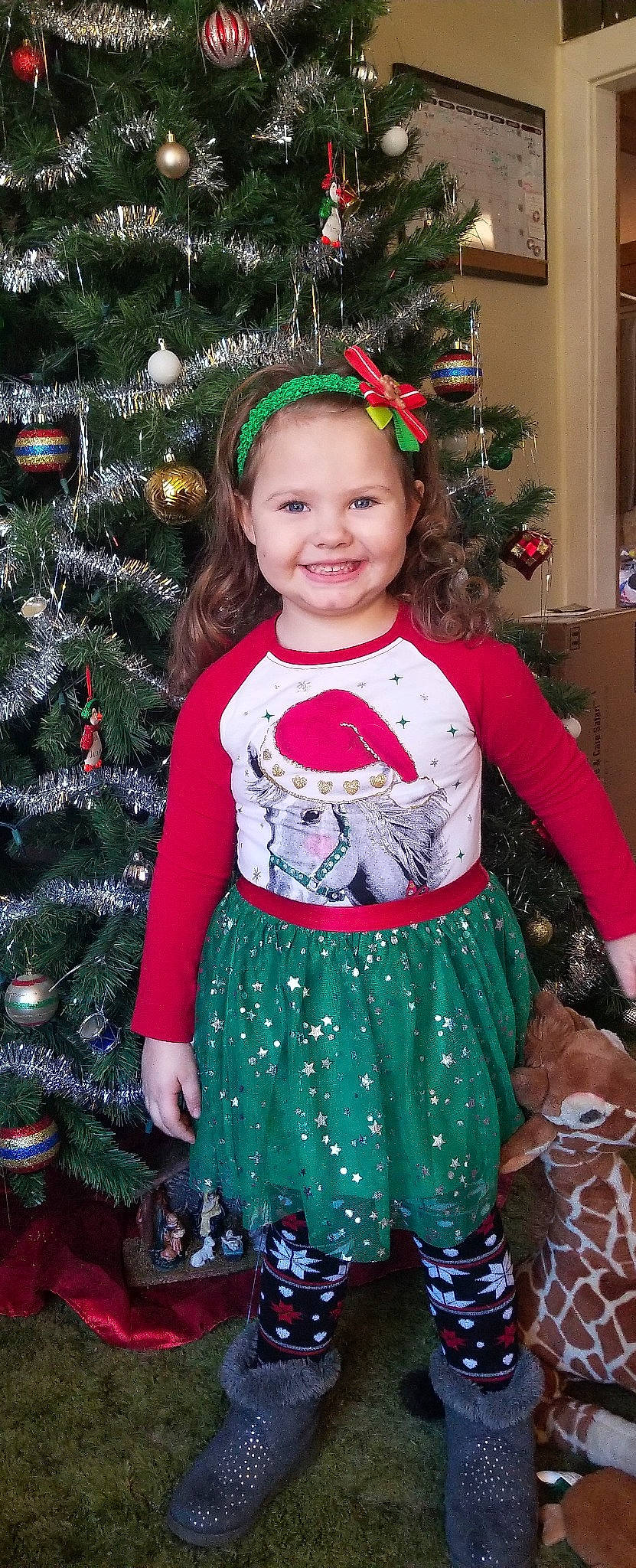 Jillian joined the competition — help win amazing prizes! child, christmas, christmas_decoration, christmas_ornament, christmas_tree, costume, event, fun, girl, holiday, joy, person, red, smile, toddler, tree