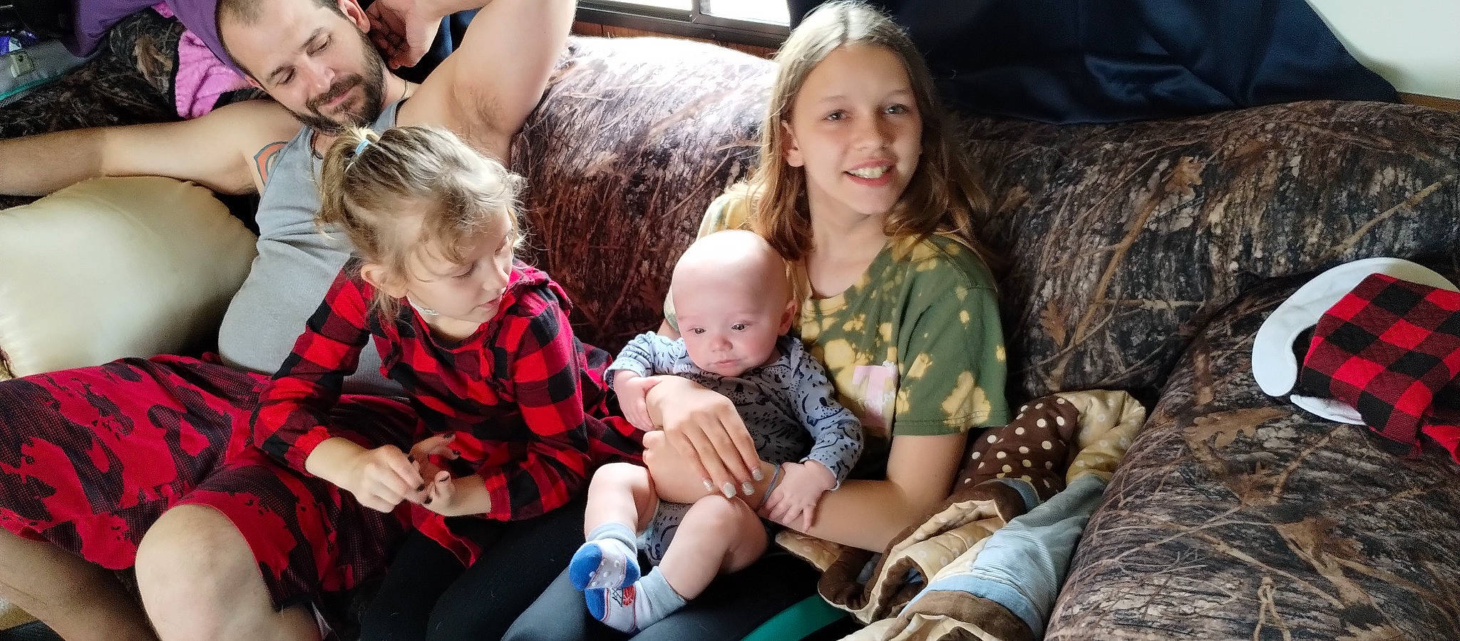 Jayden is registered to the contest to win money with this photo: baby, child, comfort, community, couch, event, eye, face, facial_expression, fun, grass, happy, joy, lap, leisure, person, photograph, sitting, skin, smile