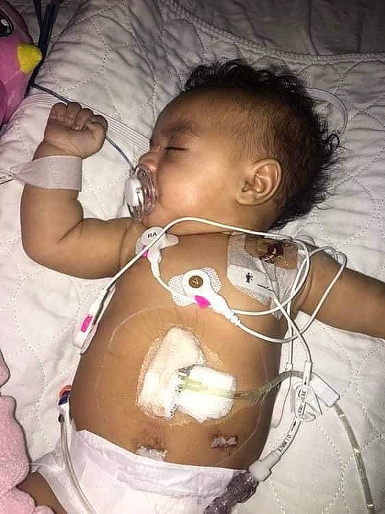 Amarianna is registered to the contest to win money with this photo: abdomen, baby, cheek, chest, comfort, ear, eye, eyelash, finger, happy, human_body, iris, lip, mouth, nose, person, skin, stomach, textile, toddler