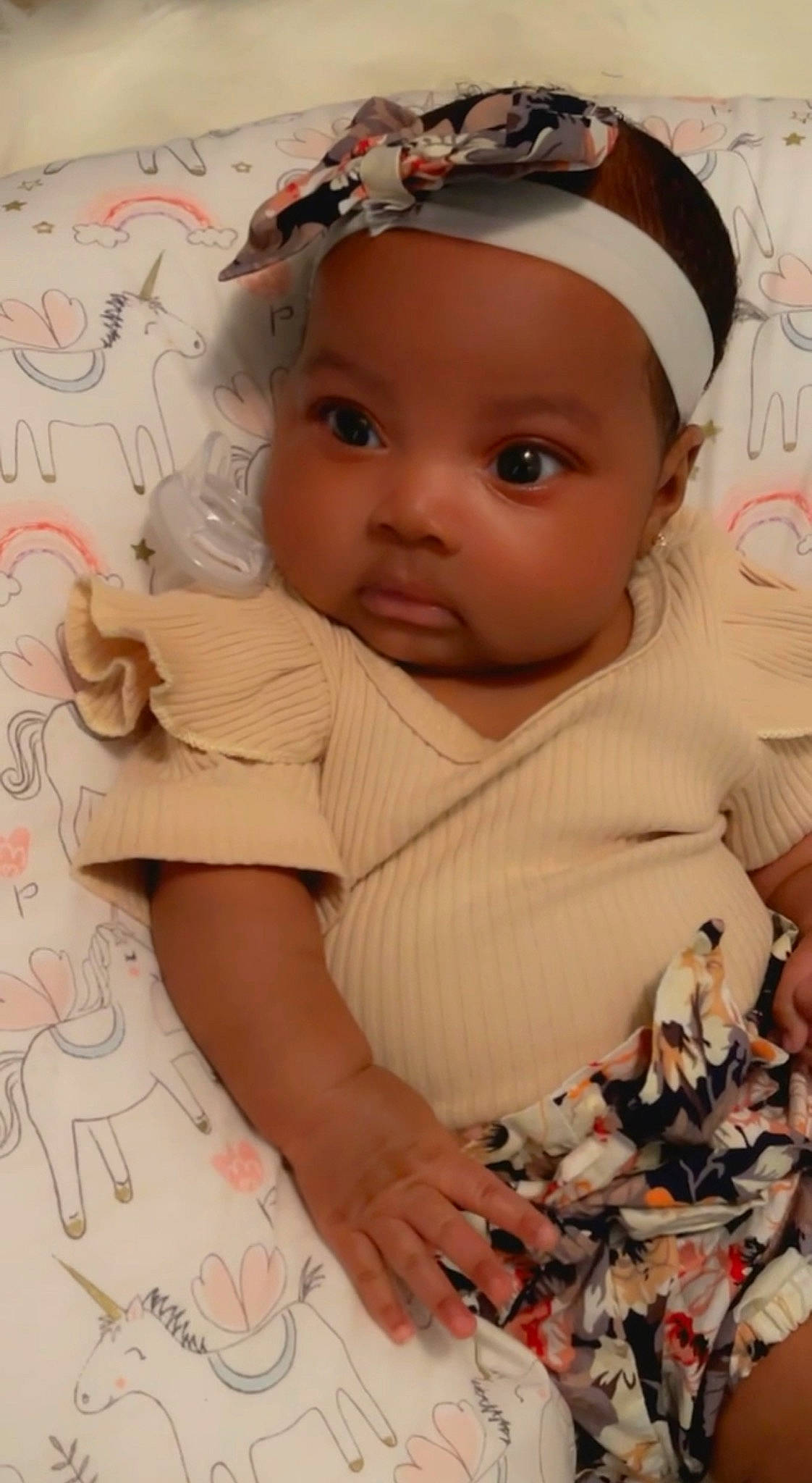 Kalayah is registered to the contest to win money with this photo: baby, baby_toddler_clothing, cheek, dress, eye, eyebrow, face, finger, happy, hat, head, headgear, headwear, iris, lip, nose, person, pink, product, skin