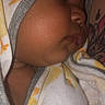 Kaia joined the competition — help win amazing prizes! baby, sleeping, face, towel, child, closeup, cheeks, skin, tattoo, pattern, yellow, soft, blanket, cozy, peaceful, wrapped, person, infant, rest, nap