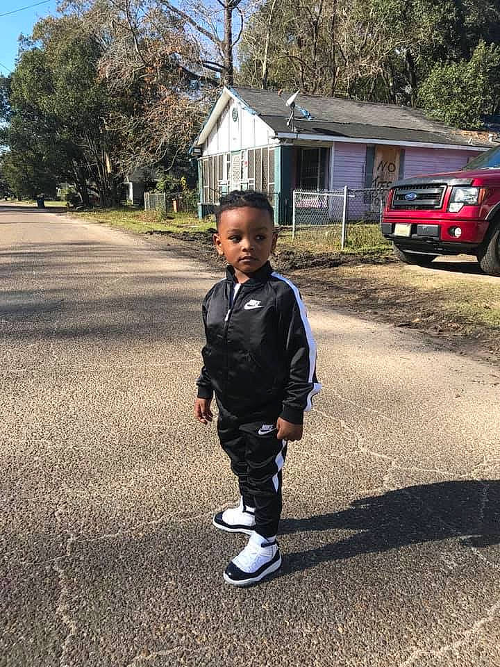 Davontae joined the competition — help win amazing prizes! asphalt, car, child, cloud, family_car, house, luxury_vehicle, male, minivan, mountain, people, person, road, sky, standing, toddler, tree, truck, vacation, vehicle