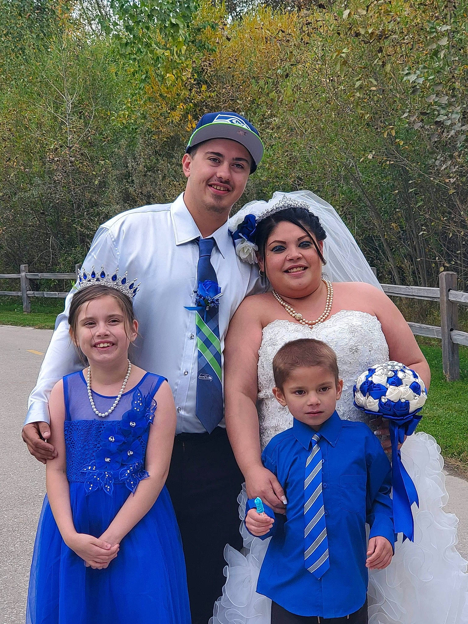 Myah joined the competition — help win amazing prizes! blue, bridal_clothing, bride, ceremony, child, dress, event, facial_expression, family, flower, formal_wear, happy, headwear, joy, people, person, photograph, smile, suit, tradition