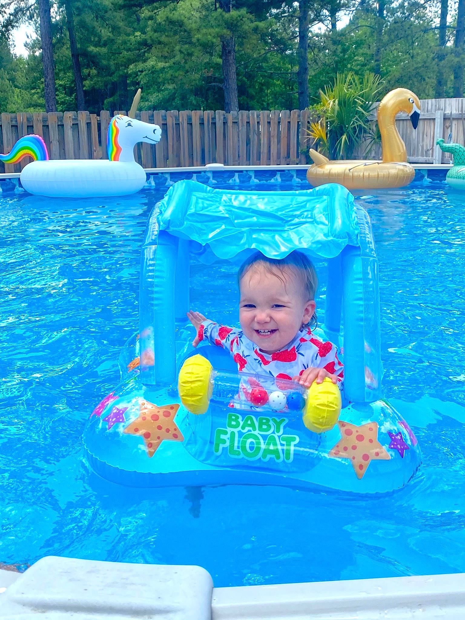 Brynleigh joined the competition — help win amazing prizes! aqua, azure, baby, blue, fun, games, happy, inflatable, joy, leisure, nonbuilding_structure, person, play, product, recreation, rectangle, smile, swimming_pool, toddler, tree
