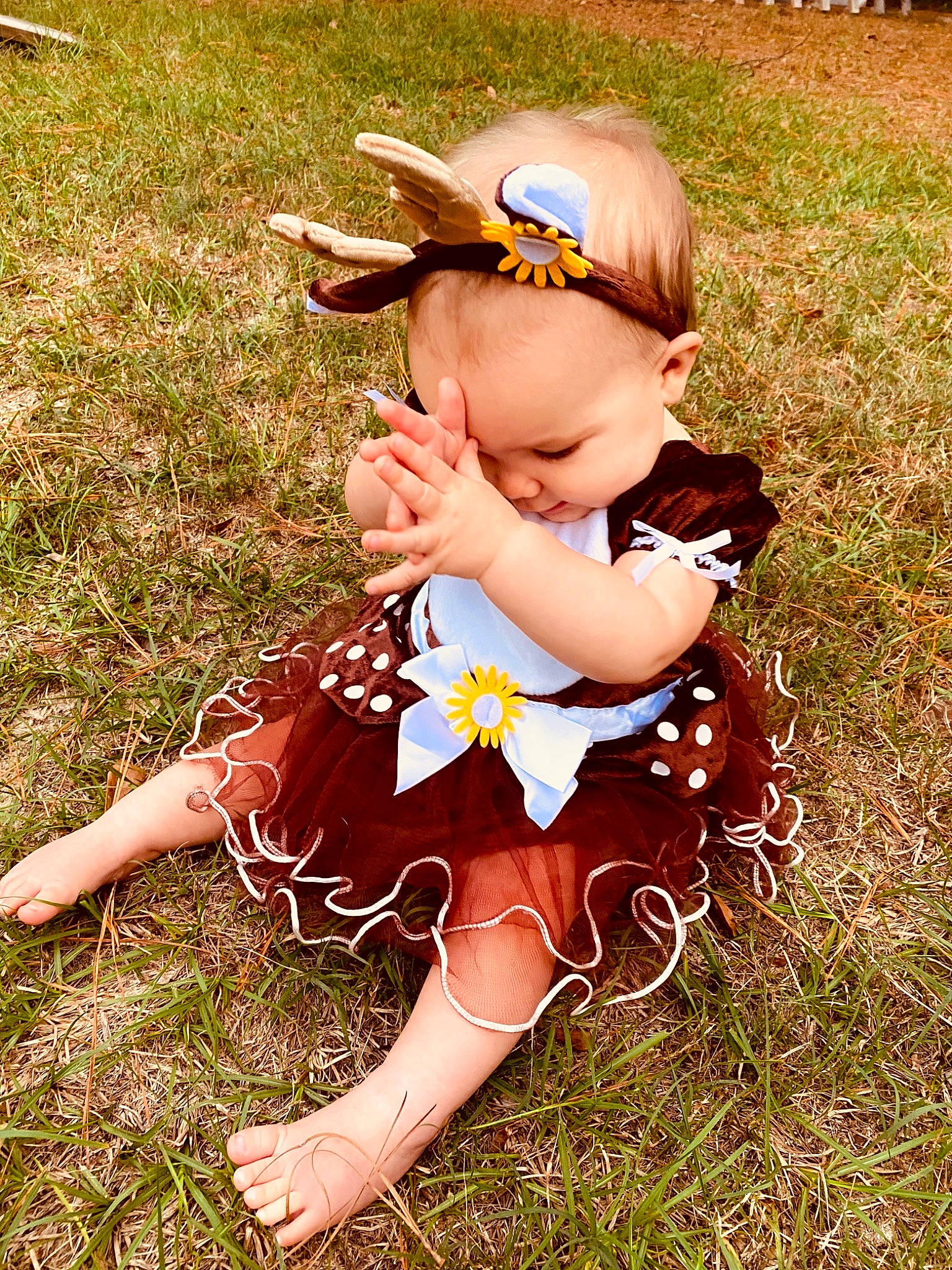 Brynleigh Summer is registered to the contest to win money with this photo: baby, baby_toddler_clothing, child, eyewear, fawn, fun, goggles, grass, grassland, happy, hat, lawn, meadow, people_in_nature, person, plant, sitting, sunglasses, toddler, toy