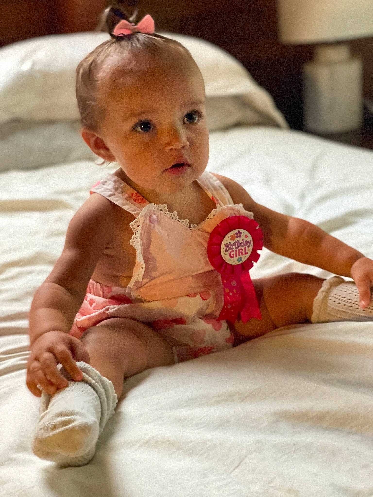 Heidi joined the competition — help win amazing prizes! baby, baby_toddler_clothing, cheek, child, comfort, dress, eye, finger, flooring, human_leg, iris, knee, mammal, person, pink, sitting, skin, sock, thigh, toddler