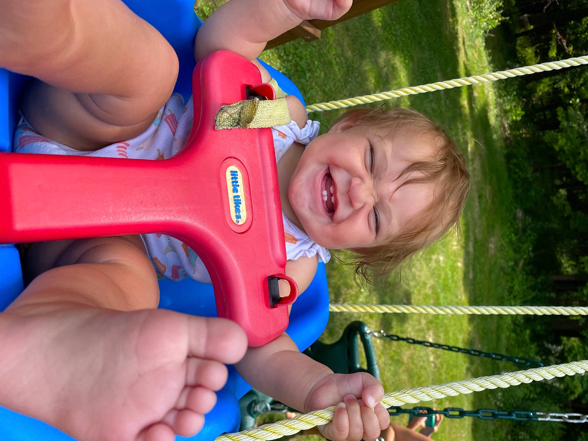 Heidi is registered to the contest to win money with this photo: blue, child, finger, fun, grass, green, hand, happy, leisure, nail, organ, person, photograph, recreation, smile, snapshot, summer, thumb, toddler, water