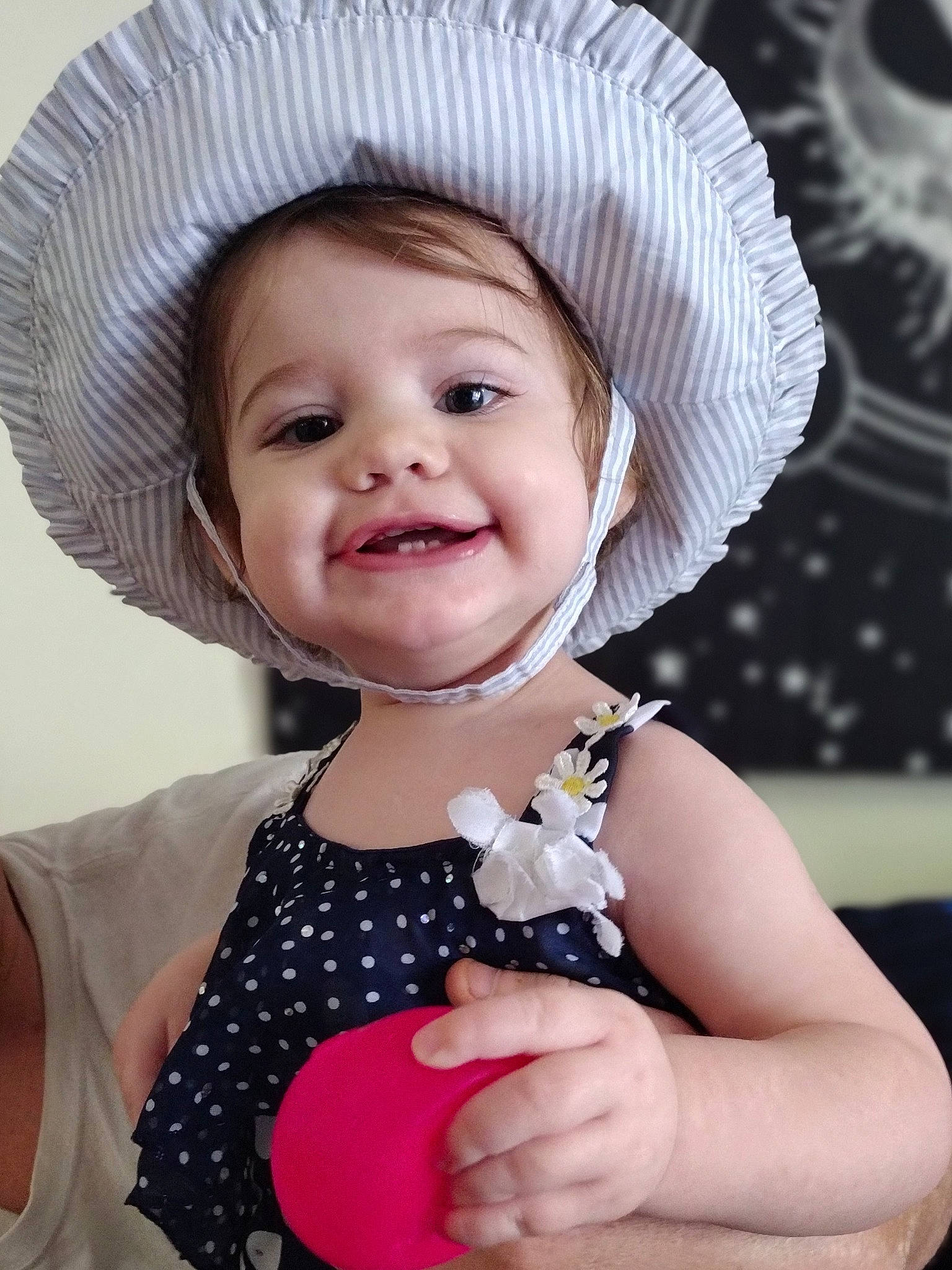 Dakota joined the competition — help win amazing prizes! baby, baby_toddler_clothing, child, clothing, costume_hat, face, facial_expression, fun, happy, hat, headgear, joy, lip, pattern, person, pink, skin, sleeve, smile, sun_hat